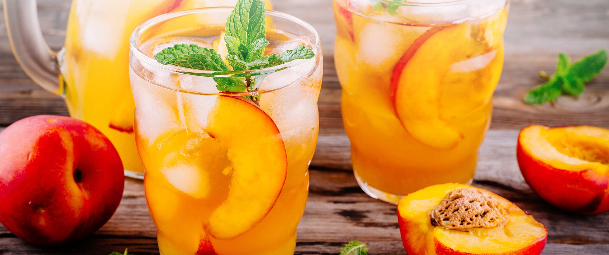 Peach Aperitif with Basil Garnish