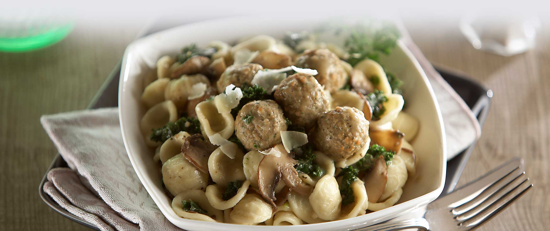 Orecchiette Pasta with Garlic, Mushrooms, Kale and Roma Gourmet Beef and Pork Meatballs