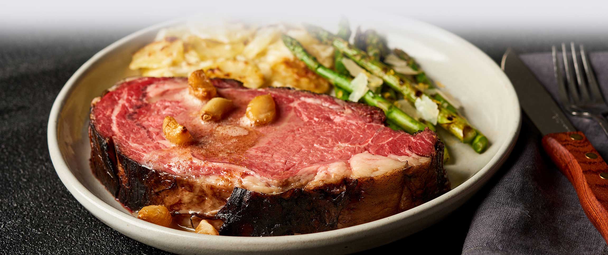 Prime Rib with Bourbon Brown Butter and Garlic Confit