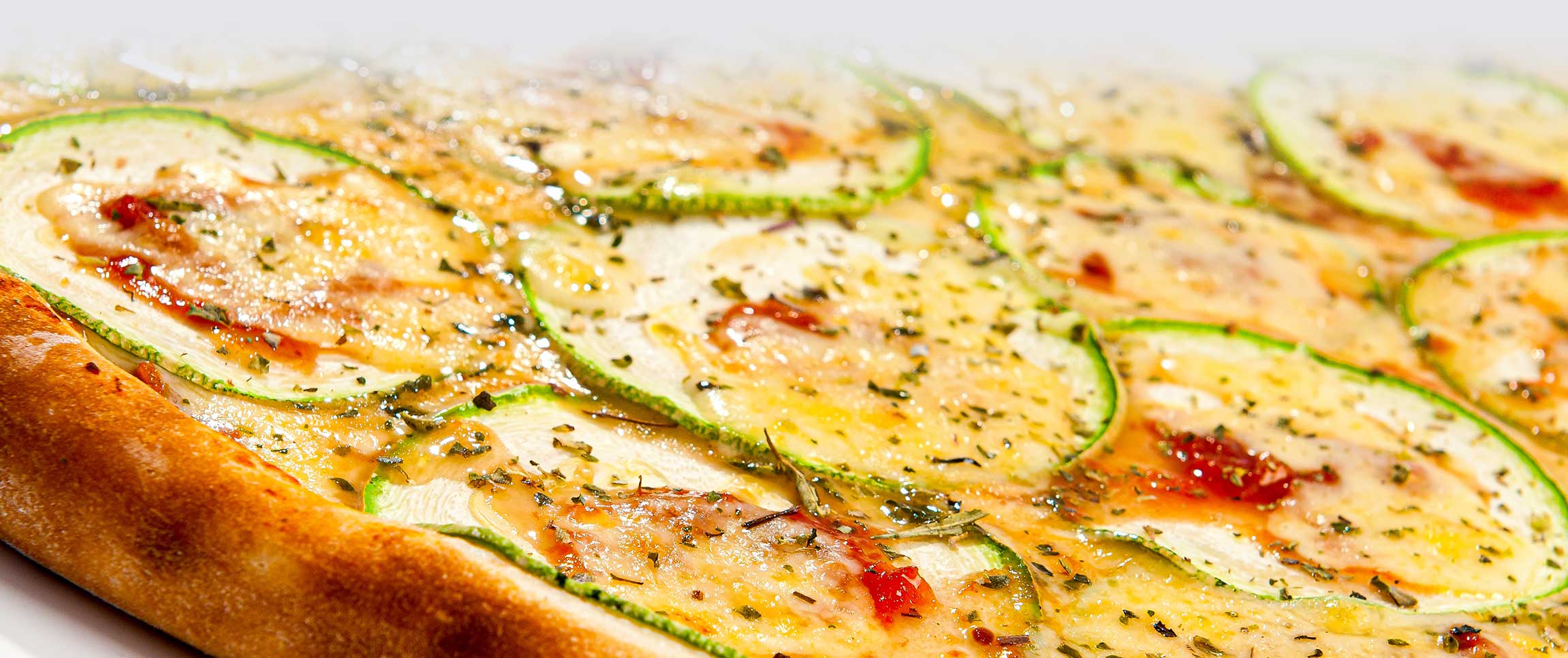 Garlic Peppered Zucchini and Red Onion Pizza