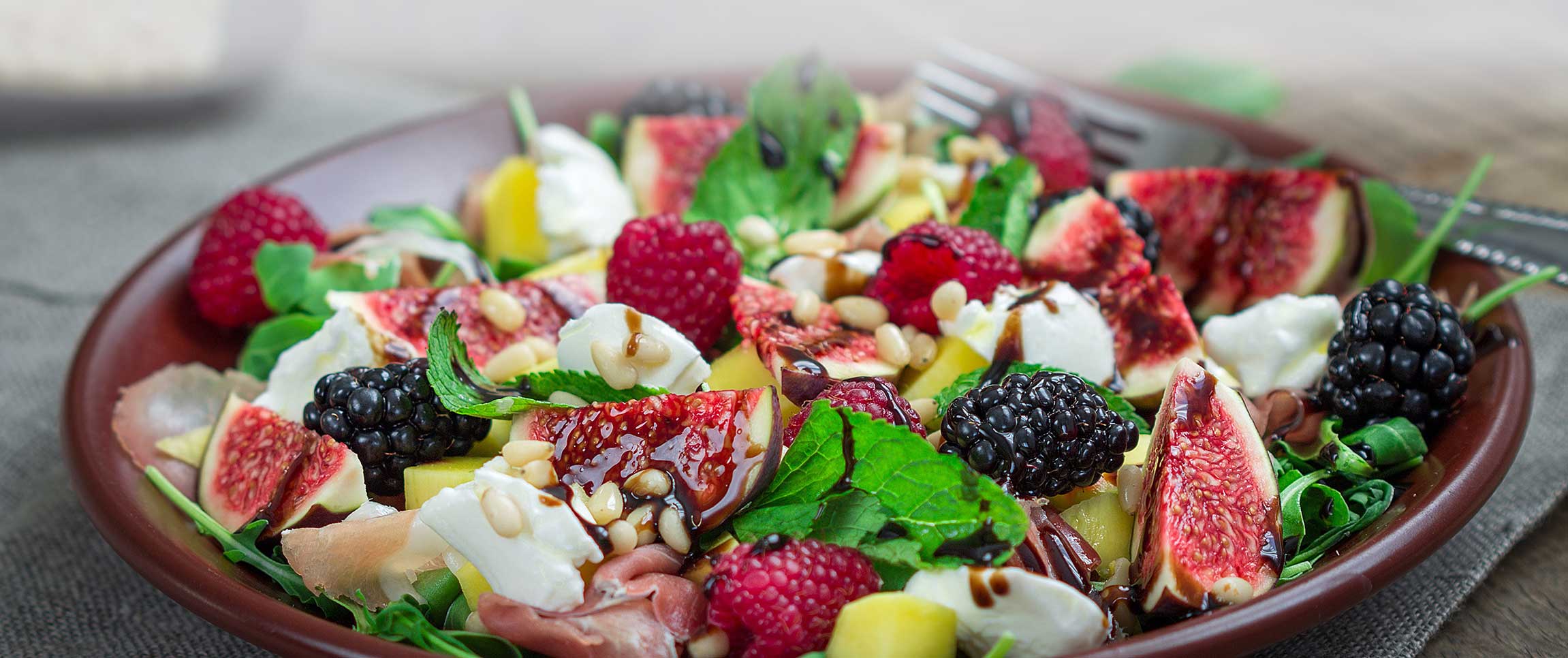 Burrata and Fig Salad with Forest Berries and Roasted Shishito Pepper Vinaigrette