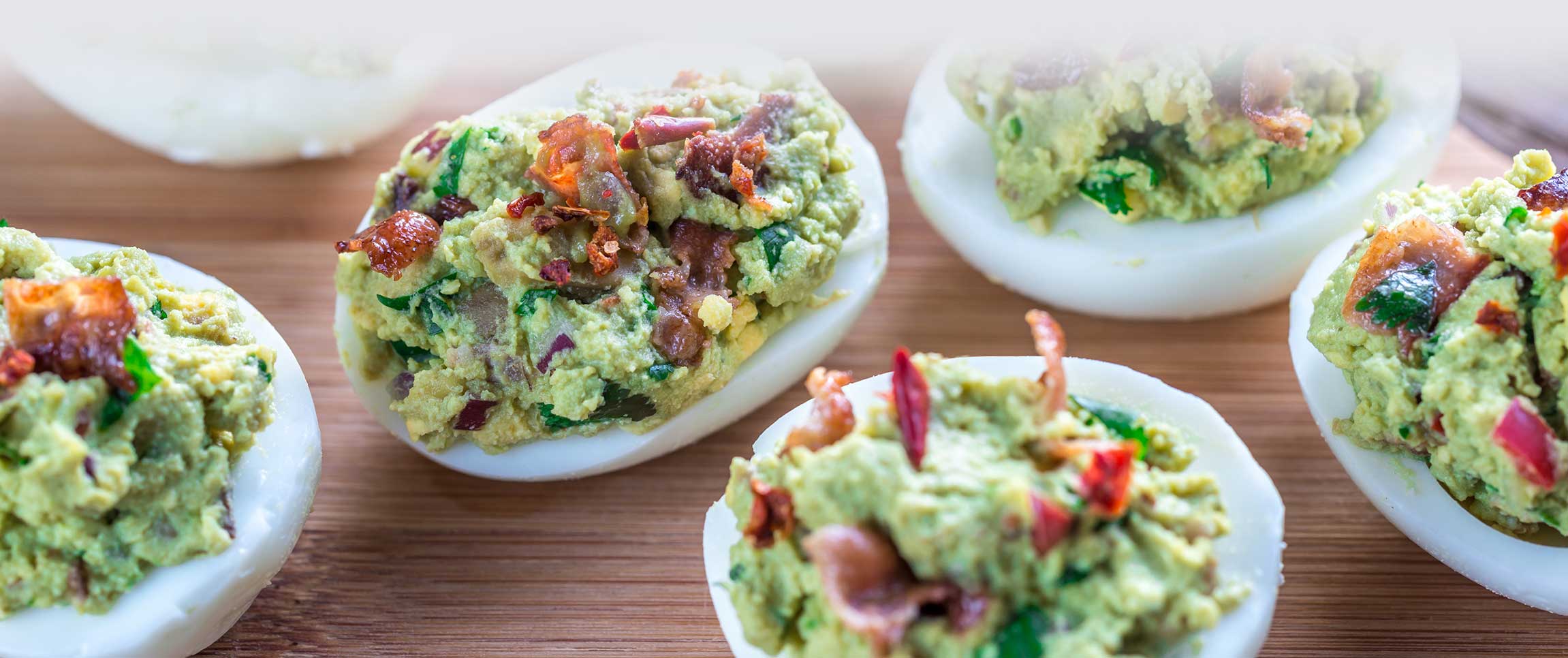 Guacamole and Bacon Deviled Eggs