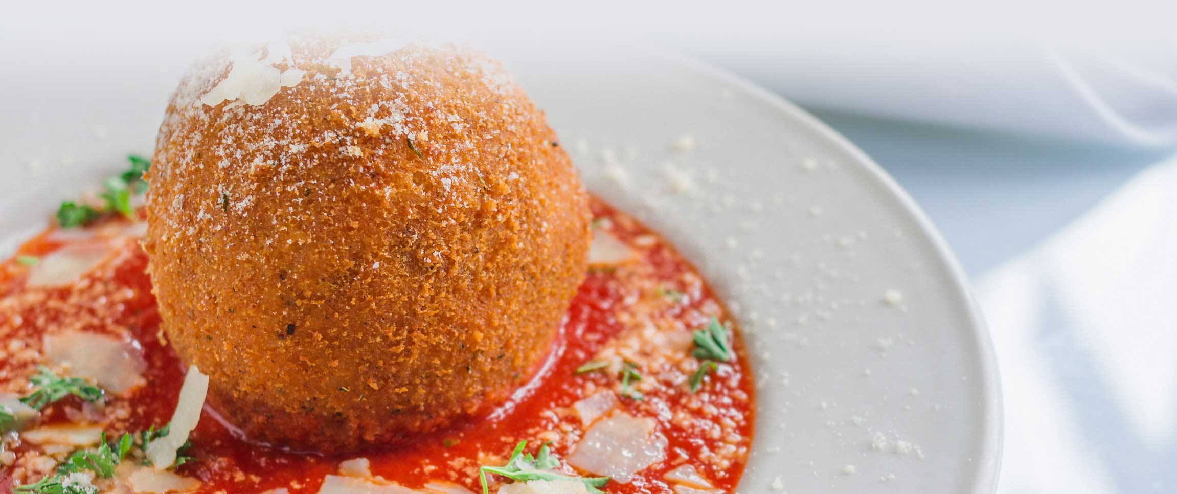 Pea and Mint Arancini with Shrimp Cioppino Sauce