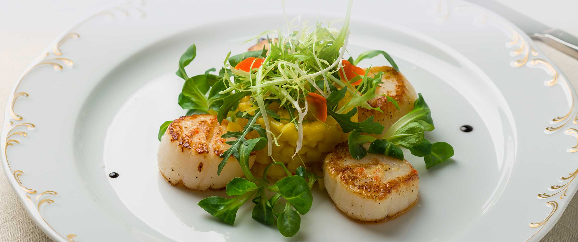 Empire’s Treasure Seared Sea Scallops with Garlic Infused Arugula Salad and Watermelon Gastrique