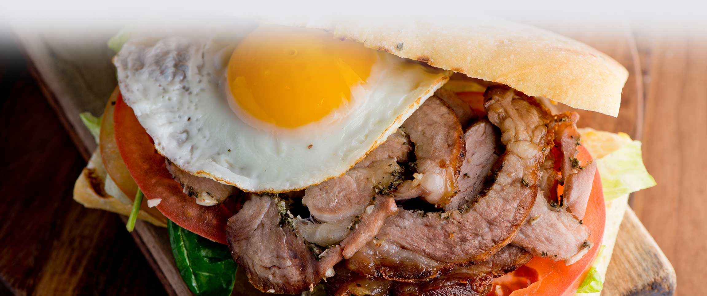 Steak and Egg Philly Cheese with Roasted Garlic Sauce