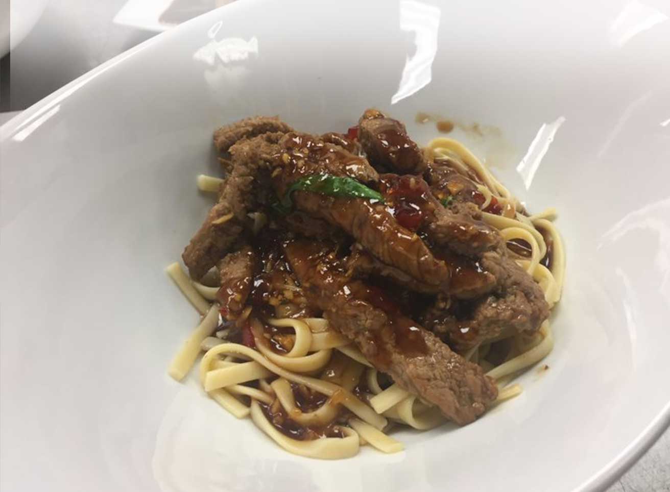 Mongolian Veal Over Pasta