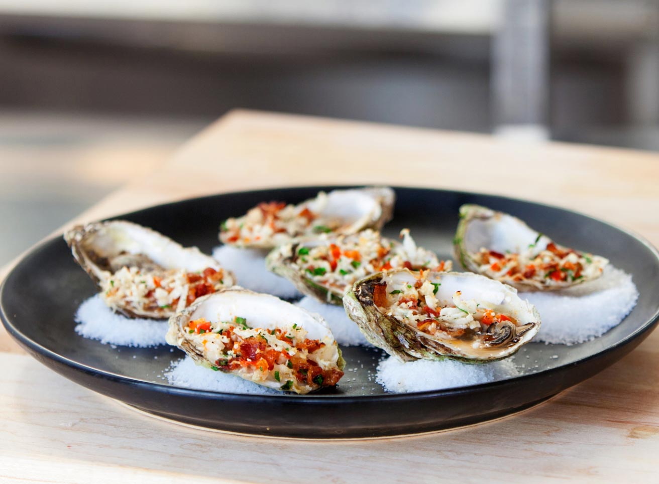 Oysters Oreganato and Sriracha Vinaigrette