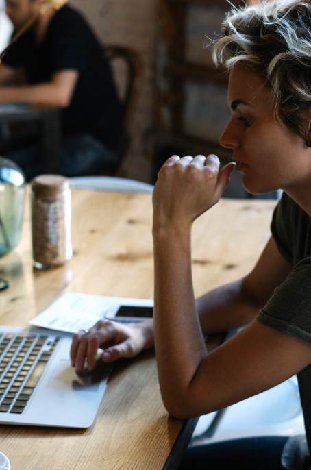 Woman viewing laptop screen