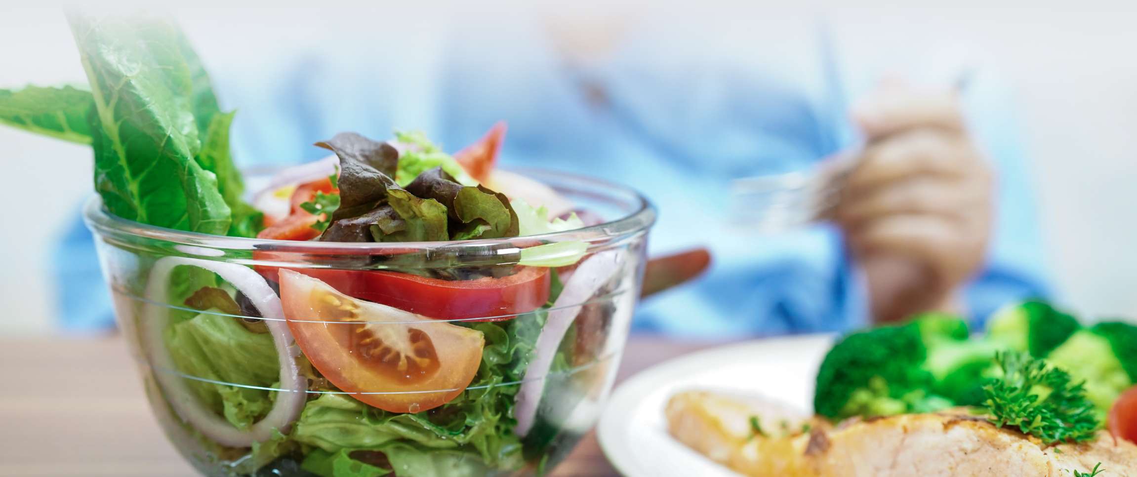Individual Sitting Down to Eat Fresh Food