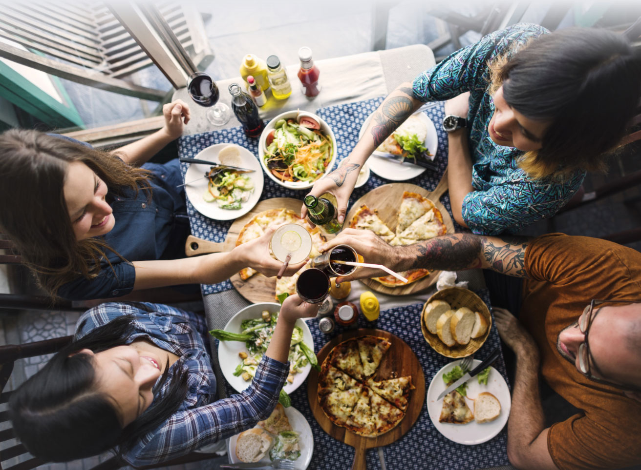 People Enjoying Dinner Around the Table