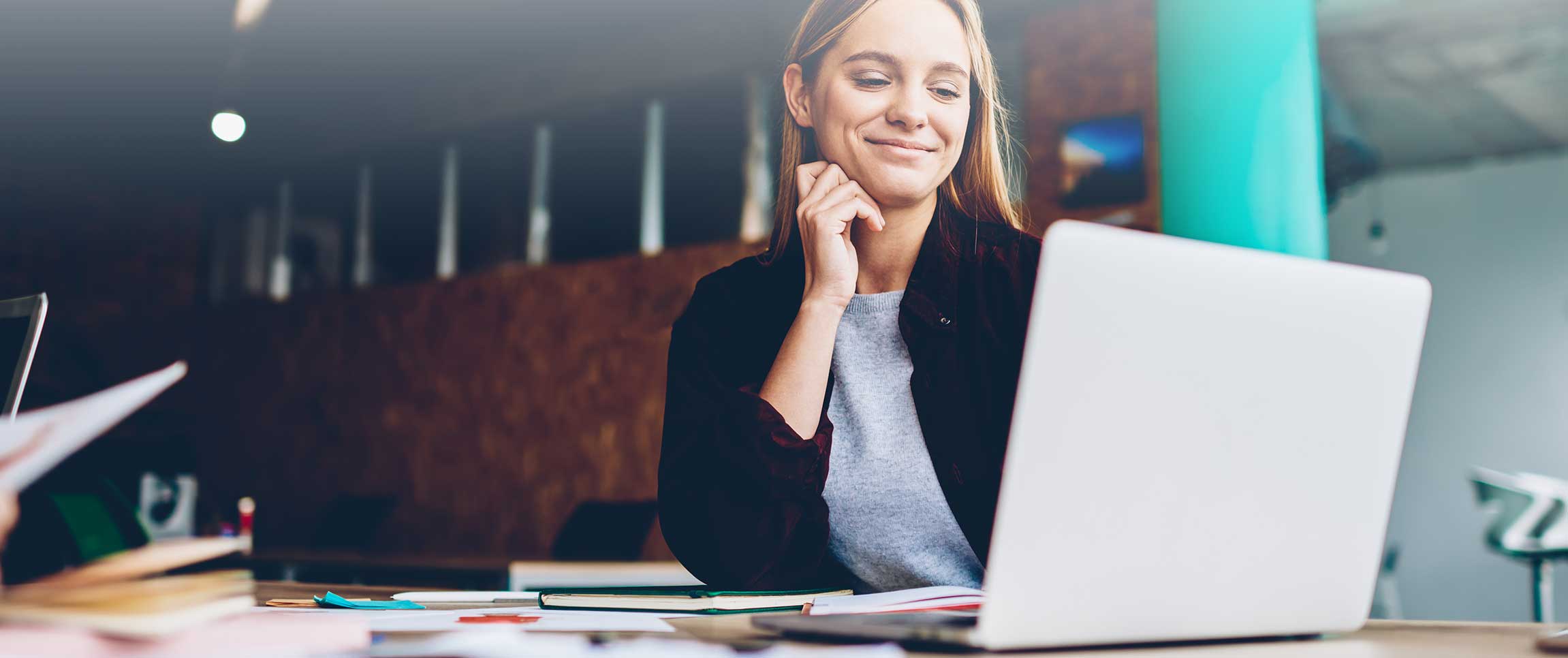 Woman viewing laptop screen